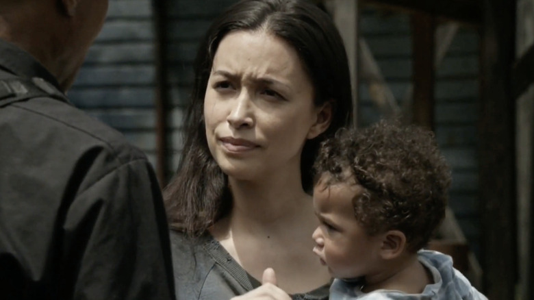 Rosita holding her baby