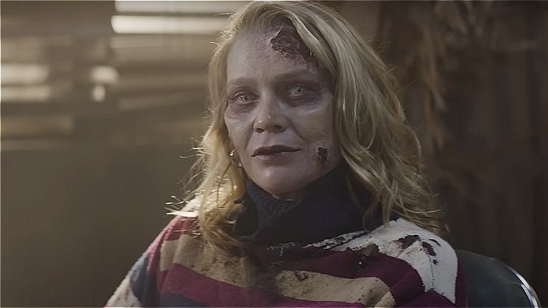 Laurie Holden as a zombie