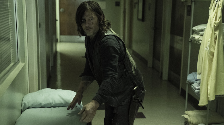 Daryl Dixon standing in a hospital hallway