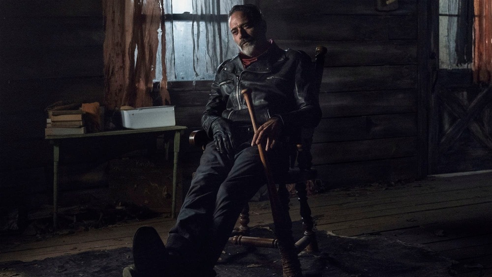 Negan sitting with bat