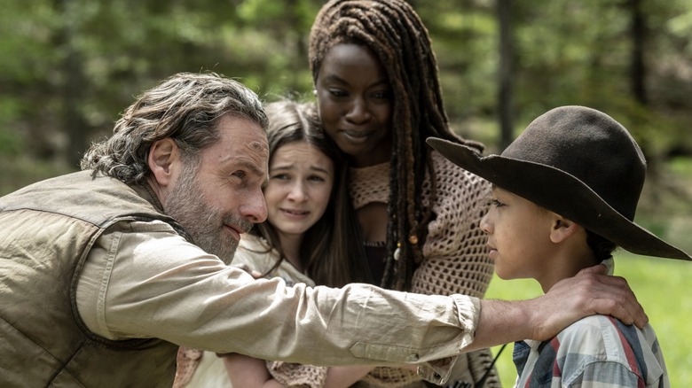 Michonne and Rick embracing family