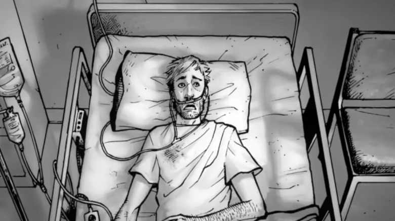 Rick laying in a hospital bed