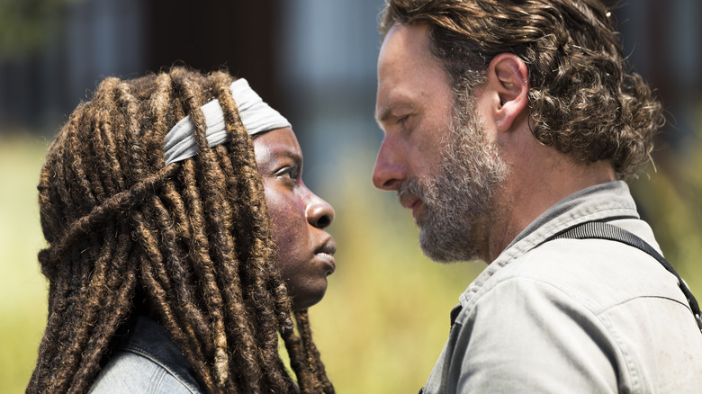 Rick and Michonne facing each other