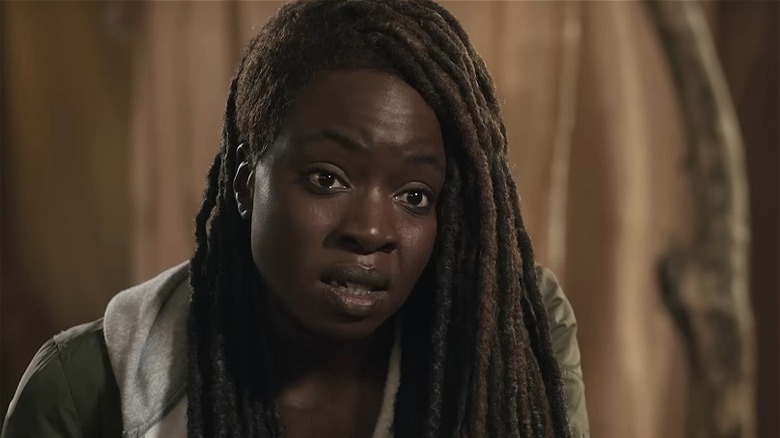 Michonne in room talking