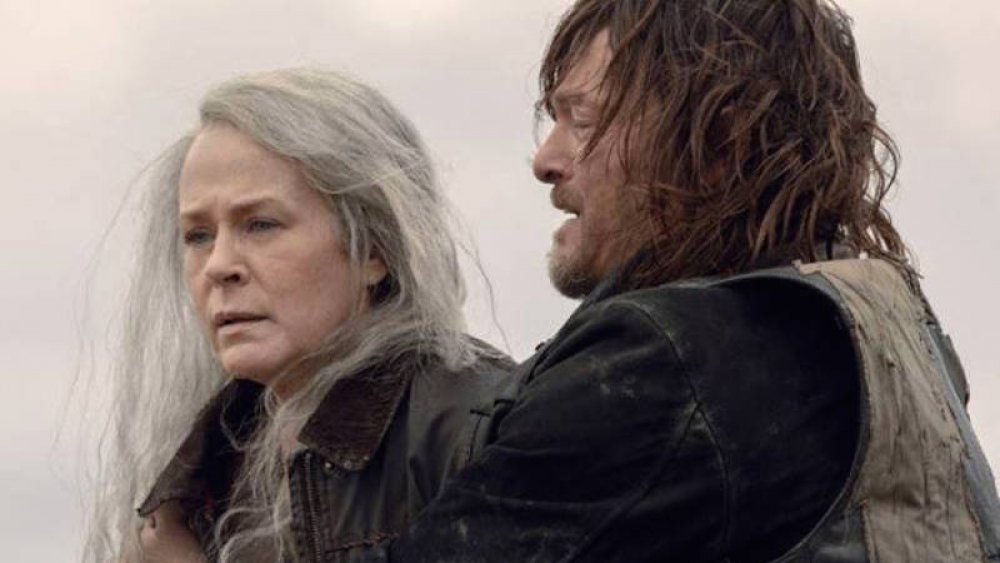 Norman Reedus as Daryl Dixon and Melissa McBride at Carol Peletier in AMC's The Walking Dead