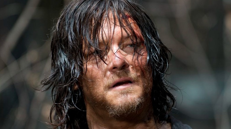 A sweaty Daryl looks worried