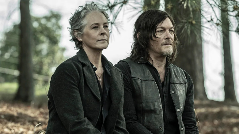 Daryl and Carol sitting together