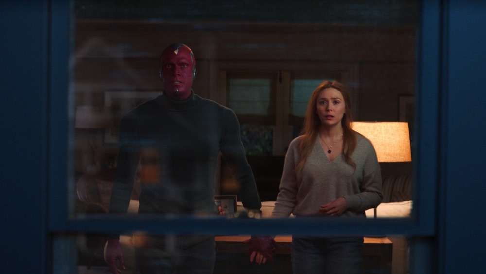 Wanda and Vision hold hands on WandaVision