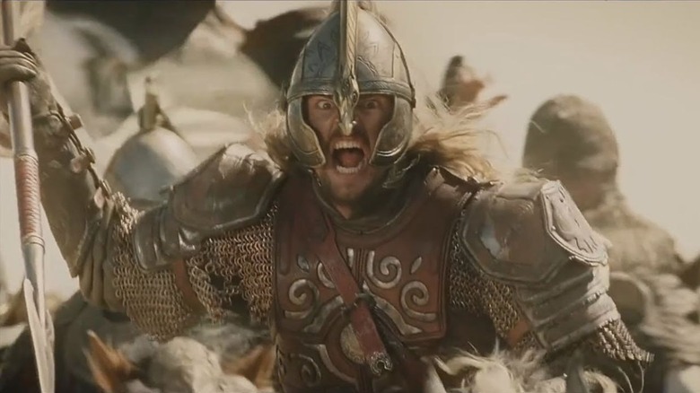 Éomer shouting and riding into battle