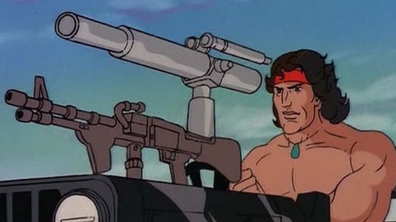 Rambo aims a machine gun while looking through scope