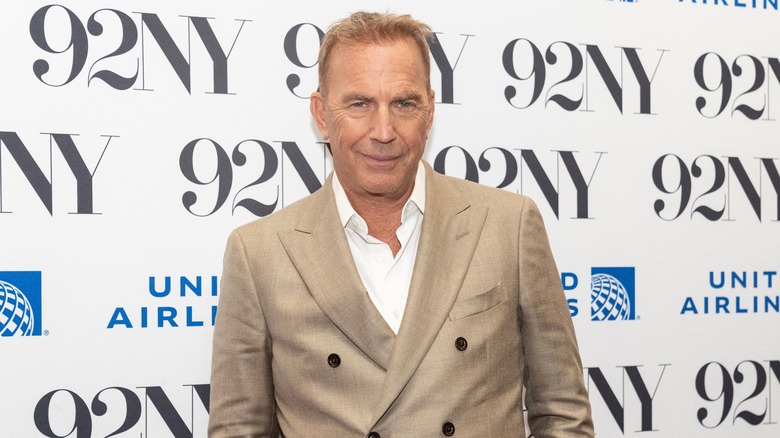 Kevin Costner smiling at event