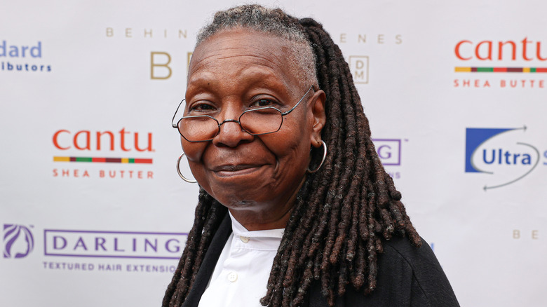 Whoopie Goldberg smiling at event