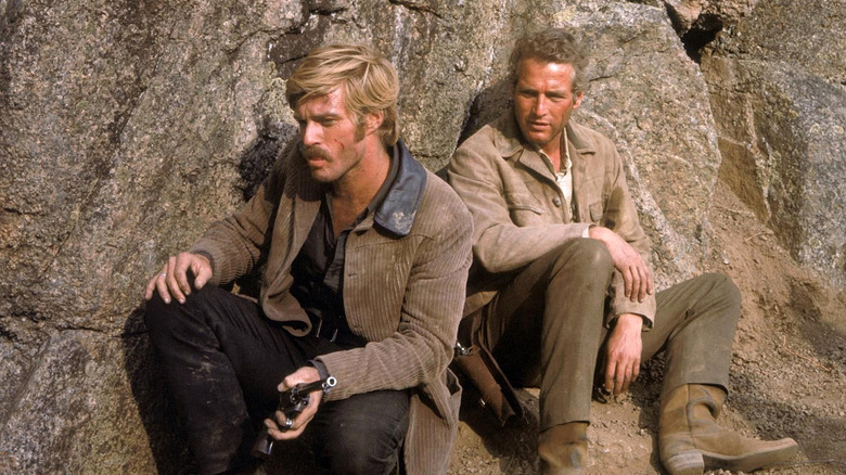 Paul Newman sits in Butch Cassidy & The Sundance Kid