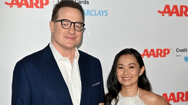 Brendan Fraser & Hong Chau smiling beside each other