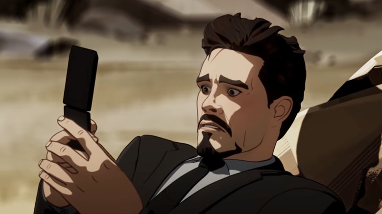 Tony Stark looking at phone