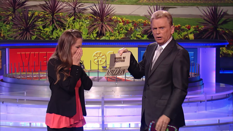 Pat Sajak with a million dollar winner