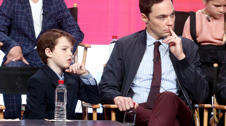 Iain Armitage and Jim Parsons listening