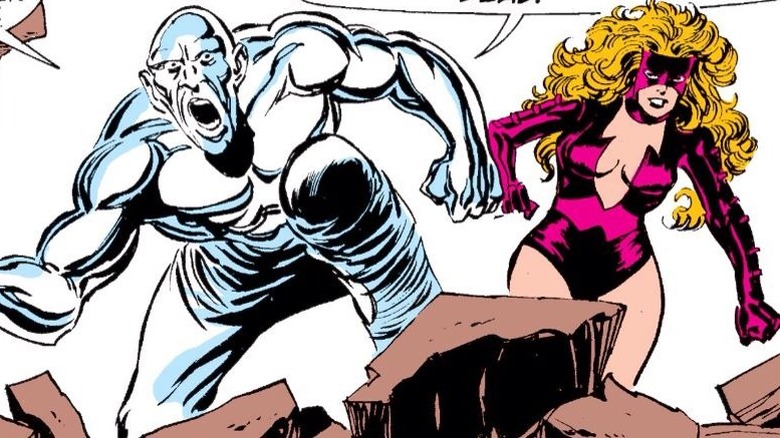 Absorbing Man and Titania fighting together