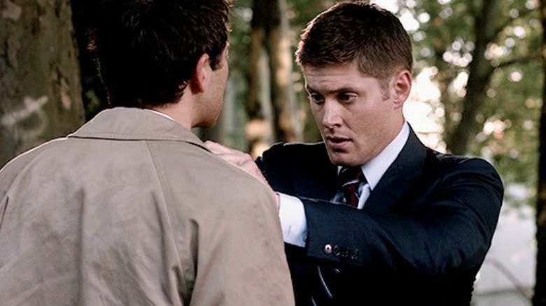 Dean fixes Castiel's coat