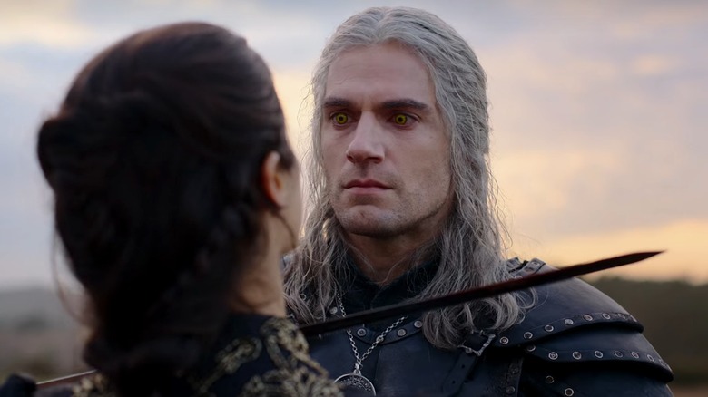 Geralt holds sword to Yennefer's throat