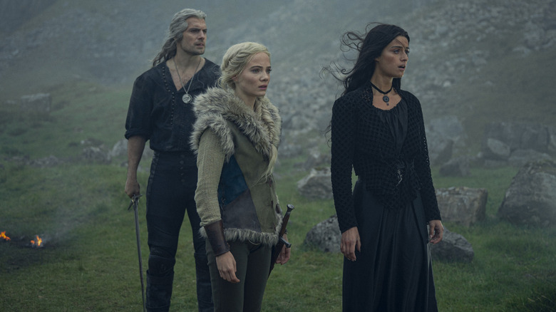 Geralt, Ciri, and Yennefer looking forward