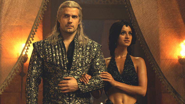 Geralt wearing gold jacket