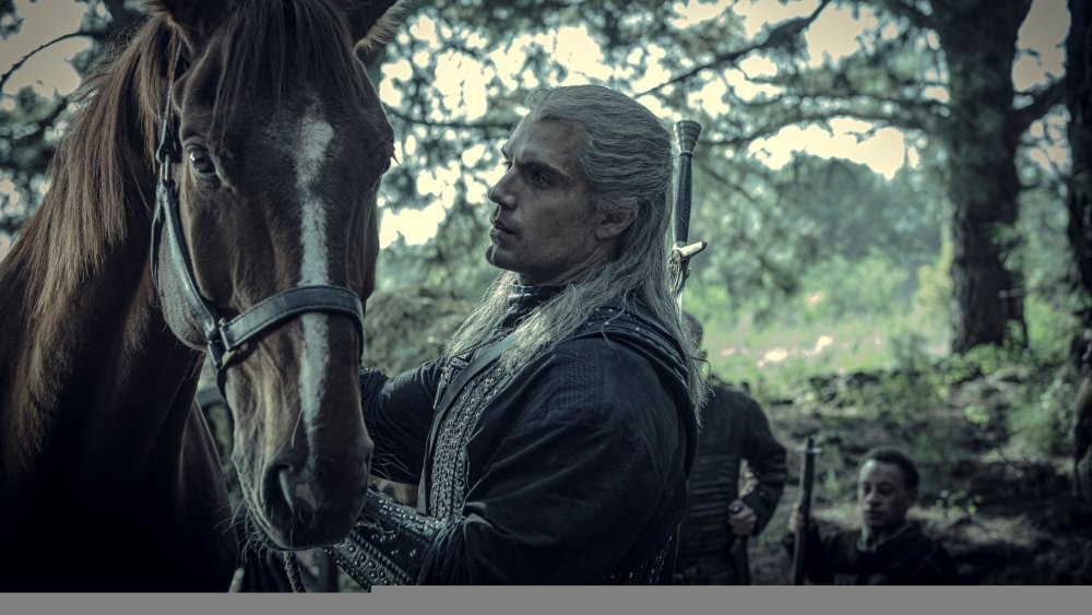 Geralt (Henry Cavill) and his faithful stead Roach in The Witcher