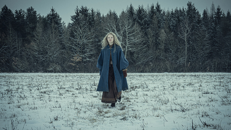 Ciri walking in snowy field