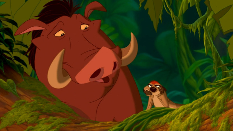 Pumbaa glancing down at Timon