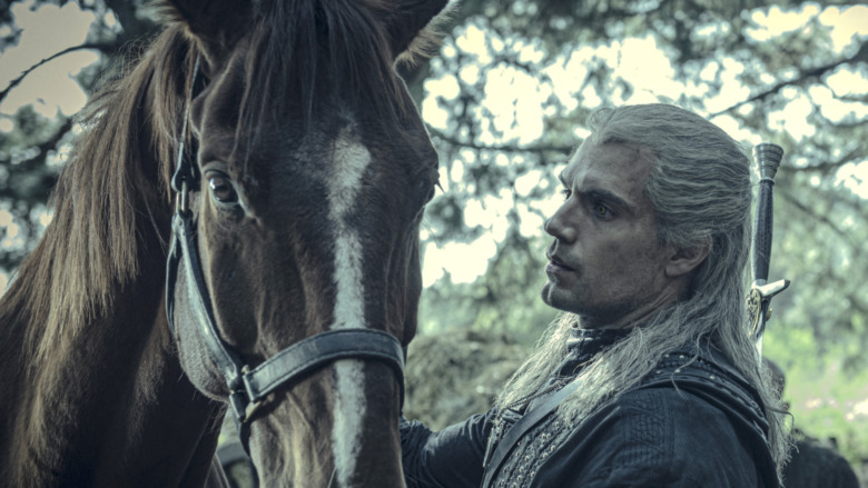 Geralt soothes his horse