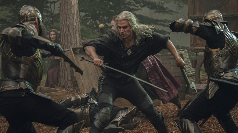 Geralt fighting in forest