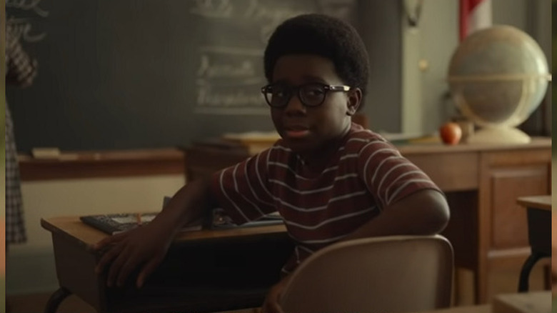 EJ in school, at his desk