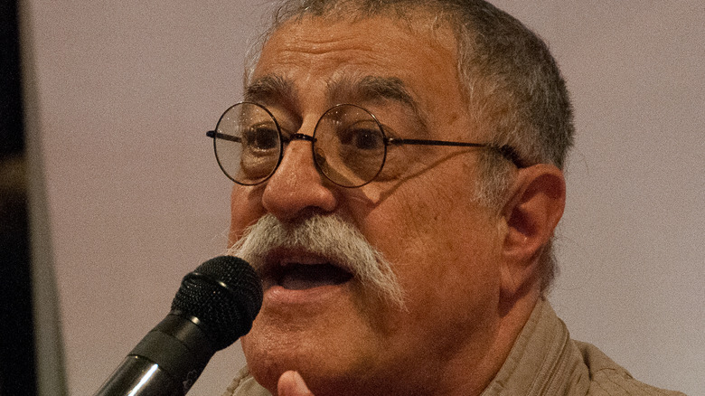 Sergio Aragonés speaking into a microphone