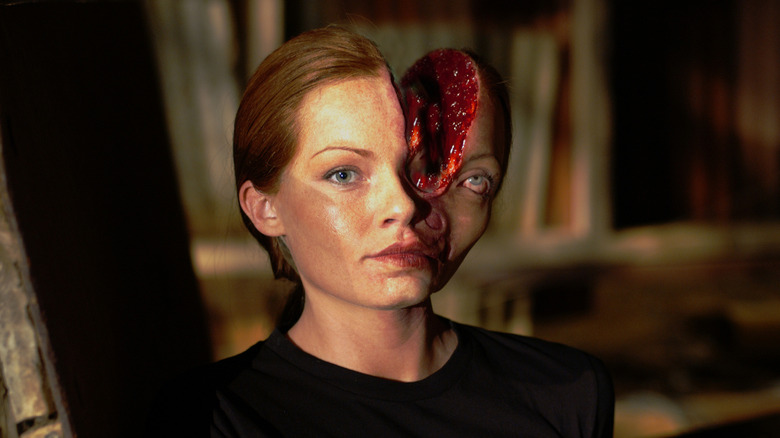 An actress with head cleaved in half in Alone in the Dark