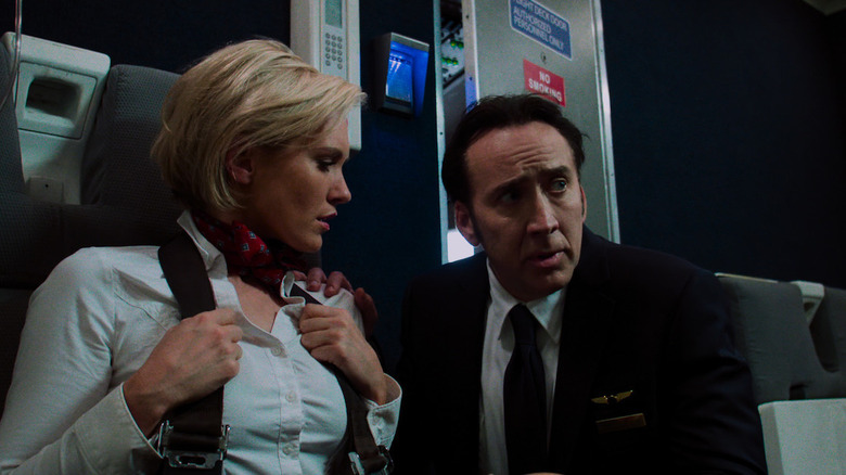 Nicolas Cage and an actress in Left Behind