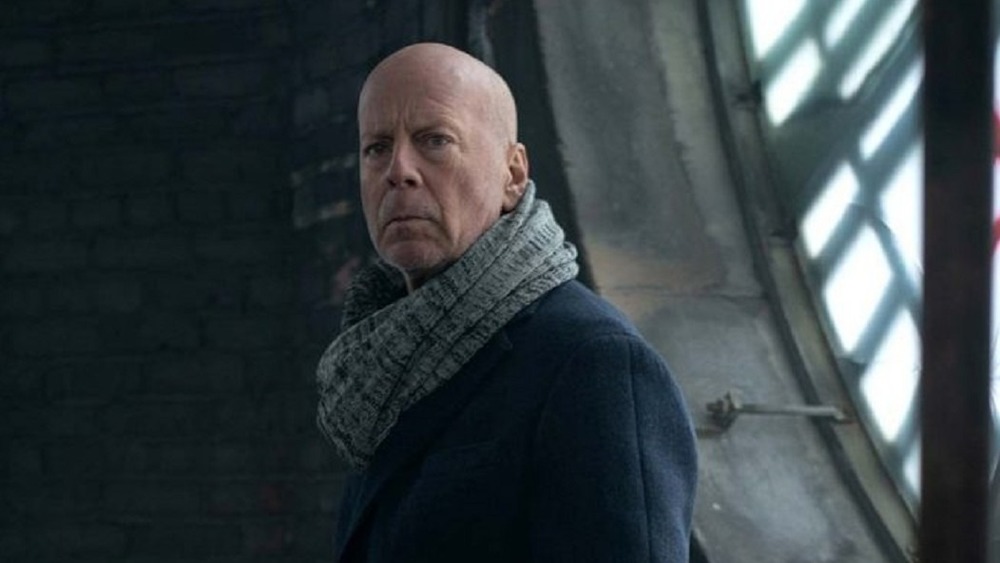 Bruce Willis wearing scarf