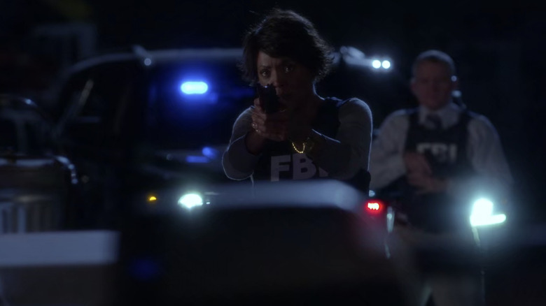 Dr. Tara Lewis pointing gun Criminal Minds