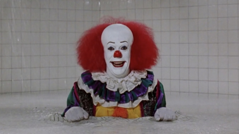 Pennywise in the shower drain.