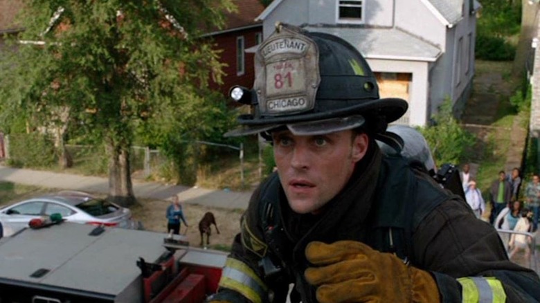 Matt Casey climbing a building