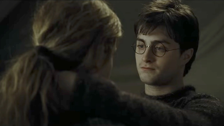 Harry about to kiss Hermione