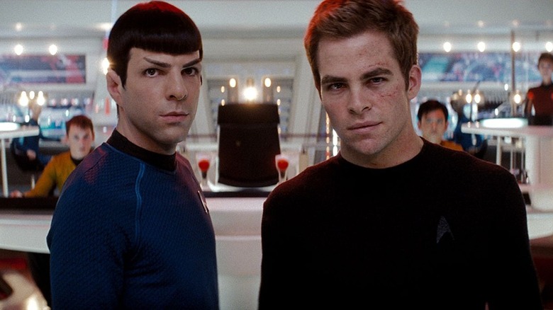 Spock and Kirk stand looking determined