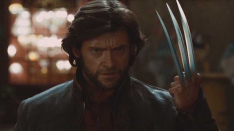 Wolverine holds up his claws