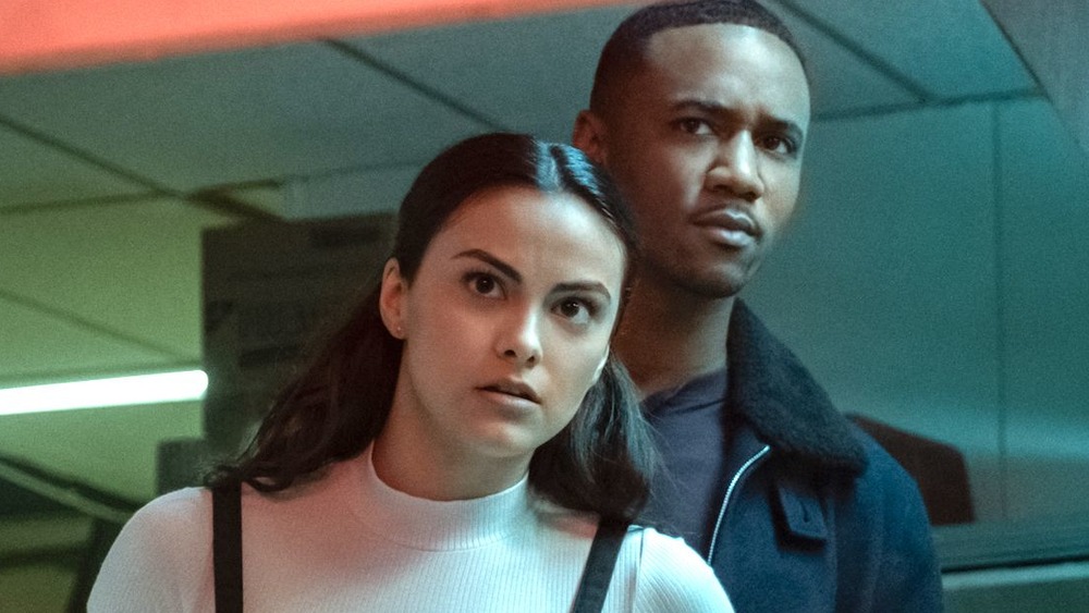 Camila Mendes and Jessie Usher in Dangerous Lies