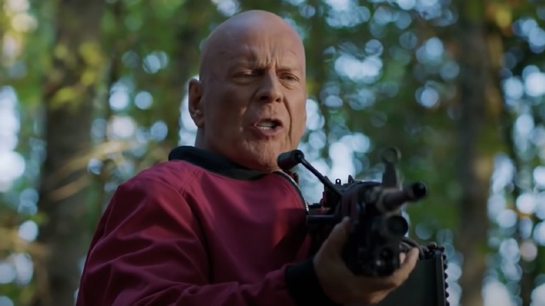 Bruce Willis with machine gun