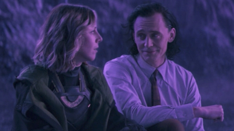 Loki sitting with Sylvie on Lamentis