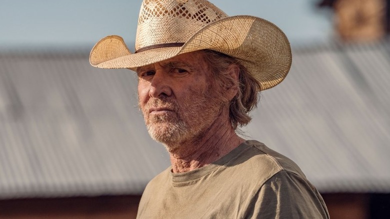 Garrett squints in a cowboy hat on "Yellowstone"