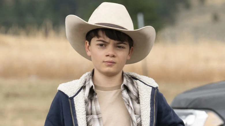 Tate squints in a cowboy hat on "Yellowstone"