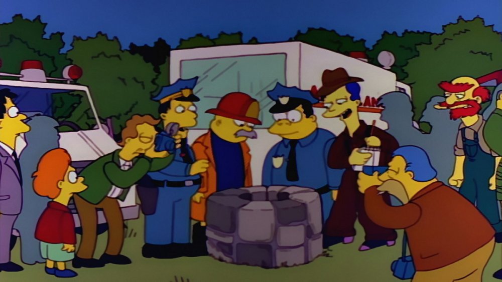 The citizens of Springfield surround a well in "Radio Bart"