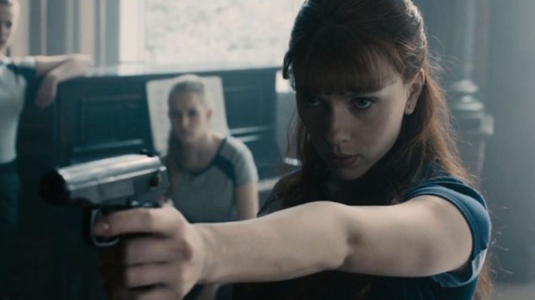 Natasha Romanoff aiming gun