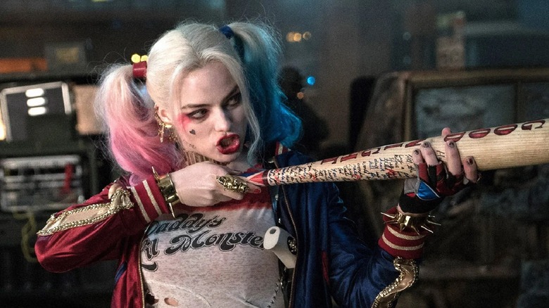 Harley Quinn wields a bat